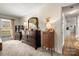 Bedroom with dresser and view into kitchen area at 1360 Hopewell Church Rd, Catawba, NC 28609