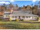 Ranch home with wraparound porch and landscaped yard at 1360 Hopewell Church Rd, Catawba, NC 28609