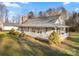 Ranch home with large porch, showcasing a side view at 1360 Hopewell Church Rd, Catawba, NC 28609