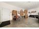 Garage with seating area, cabinets, and brick wall at 1360 Hopewell Church Rd, Catawba, NC 28609