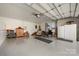 Spacious garage with seating area and storage at 1360 Hopewell Church Rd, Catawba, NC 28609