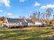 House exterior with deck, screened porch, and detached garage at 1360 Hopewell Church Rd, Catawba, NC 28609