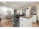 Kitchen island with granite countertop and stainless steel range at 1360 Hopewell Church Rd, Catawba, NC 28609