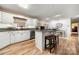 Modern kitchen with white cabinets, granite counters, and stainless steel appliances at 1360 Hopewell Church Rd, Catawba, NC 28609