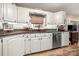 Kitchen with white cabinets, granite countertops and stainless steel appliances at 1360 Hopewell Church Rd, Catawba, NC 28609