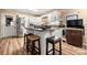 Modern kitchen with white cabinets, granite counters, and stainless steel appliances at 1360 Hopewell Church Rd, Catawba, NC 28609