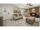 Living room with fireplace, comfortable seating, and large windows at 1360 Hopewell Church Rd, Catawba, NC 28609