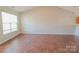 Simple dining room with tile flooring and large window at 1491 Harpers Inlet Dr, Clover, SC 29710