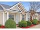 Inviting exterior of charming townhome with well-manicured landscaping at 1491 Harpers Inlet Dr, Clover, SC 29710