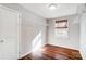 Large closet with wood floors and ample shelving at 1715 Dunkirk Dr, Charlotte, NC 28203