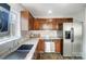 Modern kitchen with stainless steel appliances and granite countertops at 1715 Dunkirk Dr, Charlotte, NC 28203