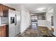 Kitchen with stainless steel refrigerator and pantry at 1715 Dunkirk Dr, Charlotte, NC 28203