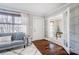 Bright living room with hardwood floors, comfy couch, and natural light at 1715 Dunkirk Dr, Charlotte, NC 28203