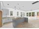 Spacious unfinished kitchen with a center island, perfect for customizing to your tastes at 1912 St John St, Charlotte, NC 28216