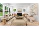 Bright and airy living room with a fireplace and comfortable seating arrangement, perfect for relaxation at 1912 St John St, Charlotte, NC 28216