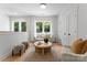 Bright living room boasts ample natural light and modern furnishings, perfect for relaxing at 1912 St John St, Charlotte, NC 28216