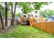 Large backyard with two tiered decks and fenced in yard at 1920 Hamorton Pl, Charlotte, NC 28205