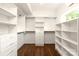 Large walk-in closet with ample shelving and hanging space at 1920 Hamorton Pl, Charlotte, NC 28205