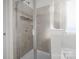 The walk-in shower features modern fixtures, neutral tile, and a clear glass enclosure at 2025 Killian Creek Dr, Denver, NC 28037