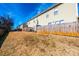 Townhouse backyards with wooden fences and satellite dishes at 217 22Nd Sw St # H, Hickory, NC 28602