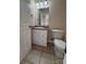 Bathroom with toilet, vanity, and granite countertop at 217 22Nd Sw St # H, Hickory, NC 28602