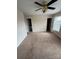 Spacious carpeted bedroom with ceiling fan, access to bathroom and closet at 217 22Nd Sw St # H, Hickory, NC 28602