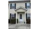 Two-story beige vinyl sided building with black trimmed windows and a covered entry at 217 22Nd Sw St # H, Hickory, NC 28602