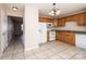 Kitchen with wood cabinets, granite counters, and white appliances at 217 22Nd Sw St # H, Hickory, NC 28602