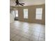 Spacious living room with tile floors and a ceiling fan at 217 22Nd Sw St # H, Hickory, NC 28602