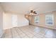 Living room with tile flooring and ceiling fan at 217 22Nd Sw St # H, Hickory, NC 28602