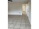 Living room with tile floor, looking toward hallway and other rooms at 217 22Nd Sw St # H, Hickory, NC 28602