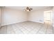 Spacious living room with tile floors and ceiling fan at 217 22Nd Sw St # H, Hickory, NC 28602