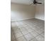 Large living room featuring tile flooring and a ceiling fan at 217 22Nd Sw St # H, Hickory, NC 28602