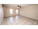 Spacious living room featuring tile floors and a ceiling fan at 217 22Nd Sw St # H, Hickory, NC 28602