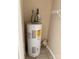 White water heater with energy guide label in a small closet at 217 22Nd Sw St # H, Hickory, NC 28602