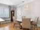 Bright dining room with a round table and modern chandelier at 2223 Croydon Rd # 103, Charlotte, NC 28207