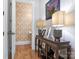 Powder room with decorative wallpaper and a pedestal sink at 2223 Croydon Rd # 103, Charlotte, NC 28207