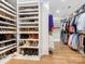 Large walk-in closet with ample shelving and hanging space at 2223 Croydon Rd # 103, Charlotte, NC 28207