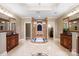 Elegant bathroom with a large walk-in shower, double vanities, and marble flooring at 237 Wilson Lake Rd, Mooresville, NC 28117