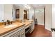 Large bathroom with double sinks and terracotta floor tiles at 237 Wilson Lake Rd, Mooresville, NC 28117