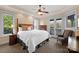 Spacious bedroom with a king-size bed and access to a balcony at 237 Wilson Lake Rd, Mooresville, NC 28117