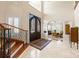 Elegant foyer with wrought iron doors and marble floors, leading to a bright, open-concept living space at 237 Wilson Lake Rd, Mooresville, NC 28117