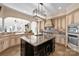 Gourmet kitchen with stainless steel appliances, granite countertops, and an island at 237 Wilson Lake Rd, Mooresville, NC 28117