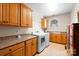 Bright laundry room with ample cabinet space and washer/dryer hookups at 237 Wilson Lake Rd, Mooresville, NC 28117