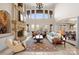 Spacious living room with stone fireplace and high ceilings at 237 Wilson Lake Rd, Mooresville, NC 28117