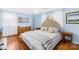 Bright bedroom with hardwood floors and a comfortable bed at 2431 17Th Ne St # 9-13, Hickory, NC 28601