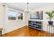 Bright dining room features hardwood floors, large windows, and a decorative chandelier at 2431 17Th Ne St # 9-13, Hickory, NC 28601