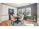 Bright dining area with built-in cabinetry and wine cooler at 245 Sweet Briar Dr, Fort Mill, SC 29707