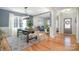 Open dining room with hardwood floors and a farmhouse table at 245 Sweet Briar Dr, Fort Mill, SC 29707