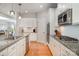 Modern kitchen with stainless steel appliances and granite countertops at 245 Sweet Briar Dr, Fort Mill, SC 29707